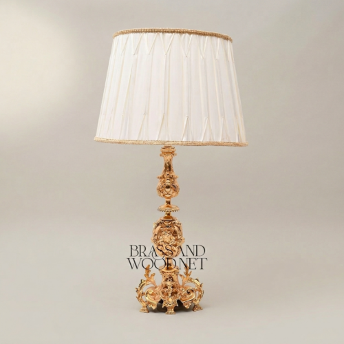 Baroque Handcrafted Brass Table Lamp Lion Medallion Rococo Base Pleated Off-White Shade Brass and Wood Gold Front | Brass & Wood