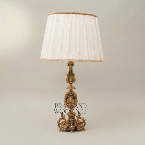 Baroque Handcrafted Brass Table Lamp Lion Medallion Rococo Base Pleated Off-White Shade Brass and Wood Antique Gold Front | Brass & Wood