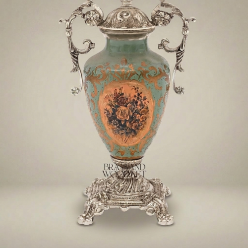 Classical Baroque Brass and Celadon Ceramic Urn Table Lamp with Floral Medallion and Pleated Off-White Shade Silver Front | Brass & Wood