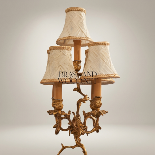 Classical Brass Cherub Figurine 3-Arm Candelabra Table Lamp with Cream Woven Shades and Marble Base Antique Gold Front | Brass & Wood