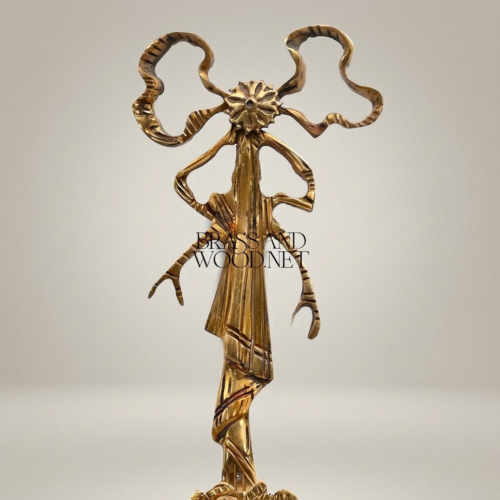 أبليك كلاسيكي نحاسي بمرآة بيضاوية وذراعين للشموع وتاج ربطة نحاسية - Antique Gold
