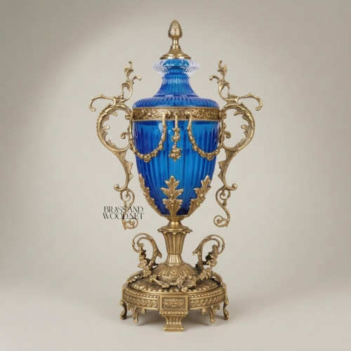 Neoclassical Cobalt Blue Crystal Lidded Urn Vase with Ornate Brass Swag Mounts and Scroll Handles Antique Gold Front | Brass & Wood